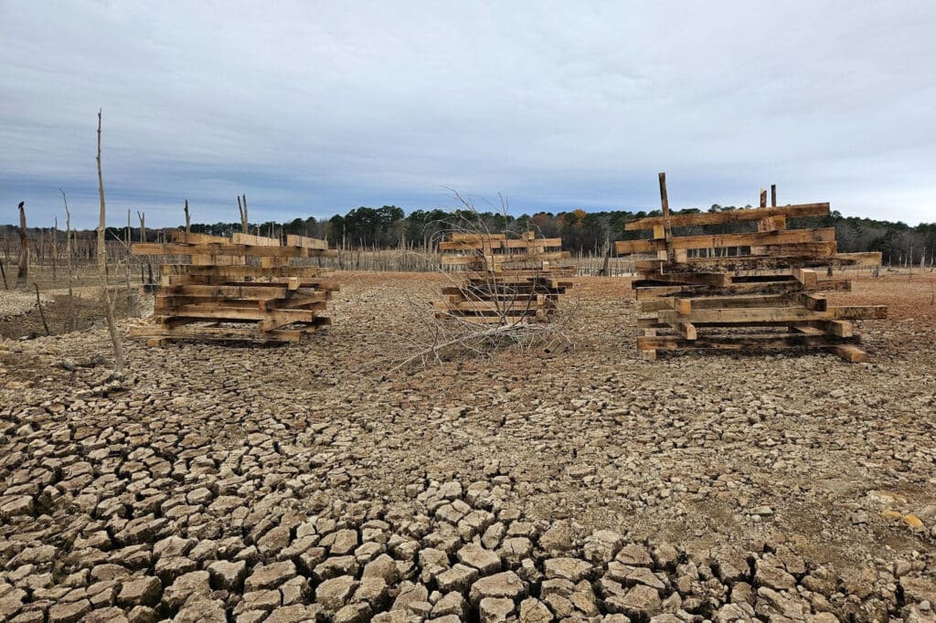 LOG CRIBS: AGFC staff constructed dozens of structures using rough-cut timbers to create cover for baitfish and ambush locations for predatory fish. AGFC photo courtesy of Andy Yung.